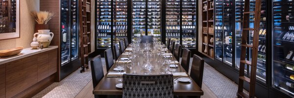 Long conference table with place settings